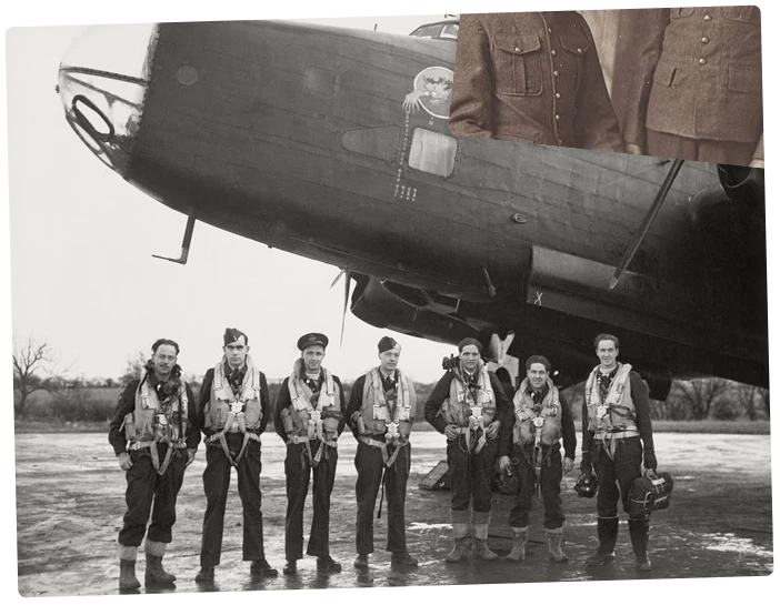 A bomber crew in flying kit lined up in front of their aircraft